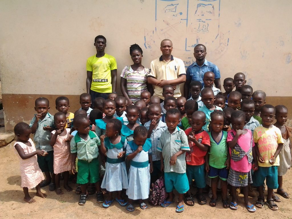 mr-anthony-kwaku-amoah-standing-2nd-right-in-a-group-photograph-with-pupils-and-teachers
